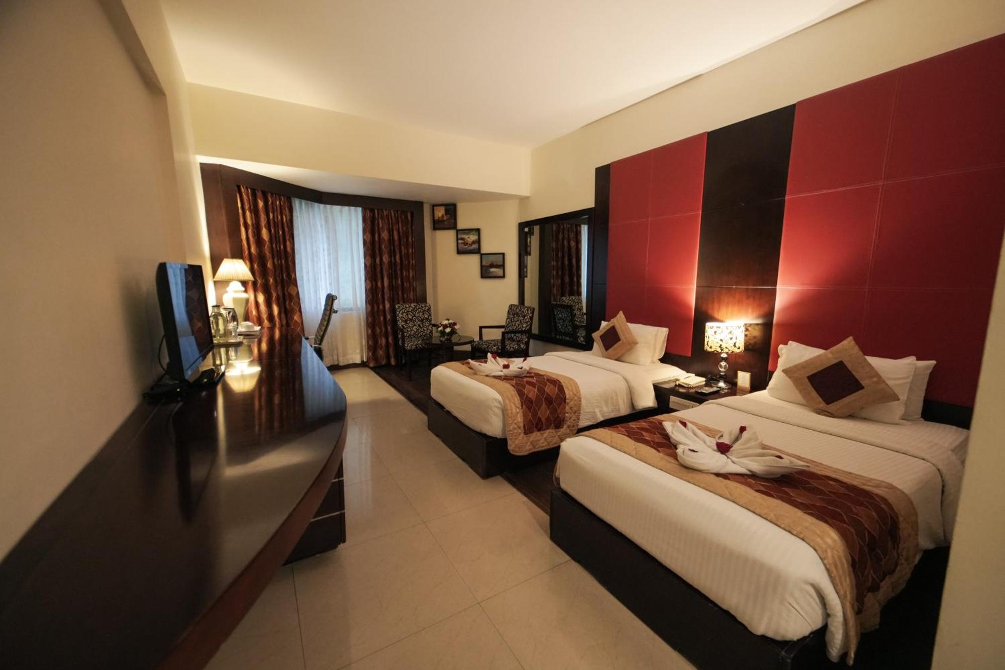 The South Park Hotel Thiruvananthapuram Buitenkant foto